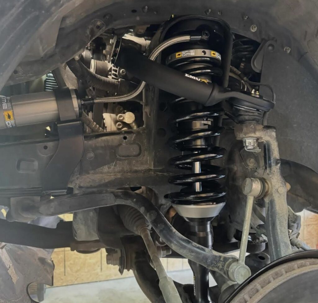 Old Man Emu BP-51 coilover and upper control arm fitted to a truck front end
